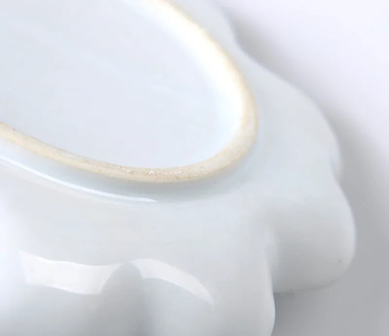 White ceramic plum blossom design artist palette for watercolour, acrylic and oil painting in three sizes