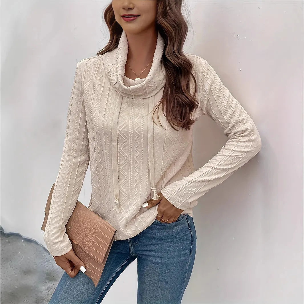 Apricot coloured long sleeve hooded pullover sweater with drawstring