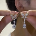 Women's bow stud earrings with electroplated platinum finish on zinc alloy
