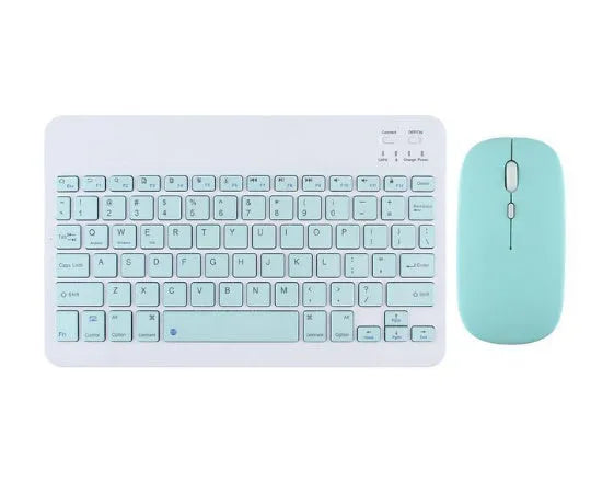 Compact white Bluetooth keyboard for tablet and PC use on a wooden desk