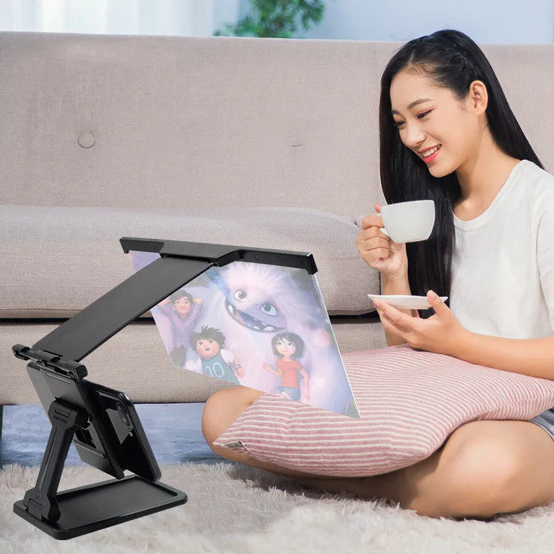 Black L20 split design 12-inch mobile phone screen magnifier with adjustable folding stand on a table.