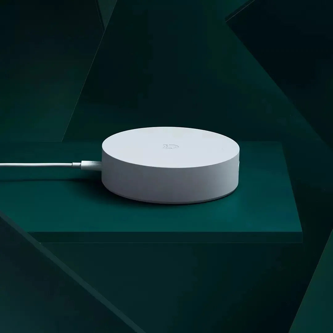 White round Xiaomijia smart home gateway with UK plug for remote device control