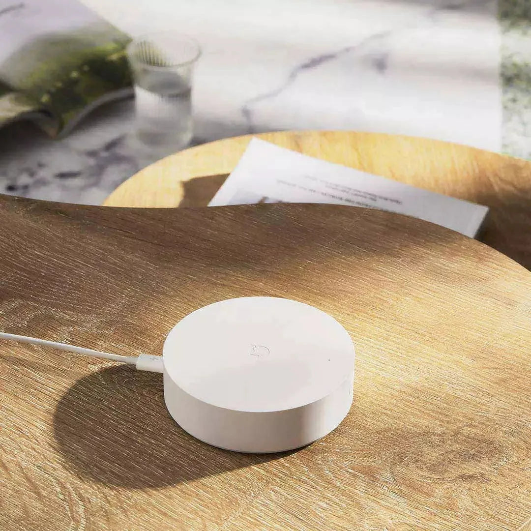 White round Xiaomijia smart home gateway with UK plug for remote device control