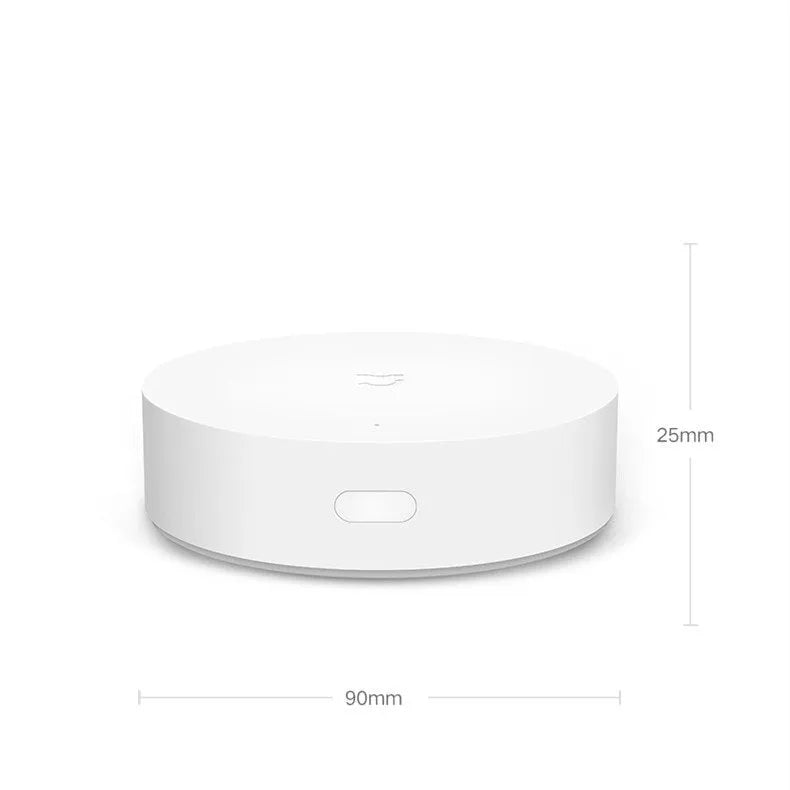 White round Xiaomijia smart home gateway with UK plug for remote device control