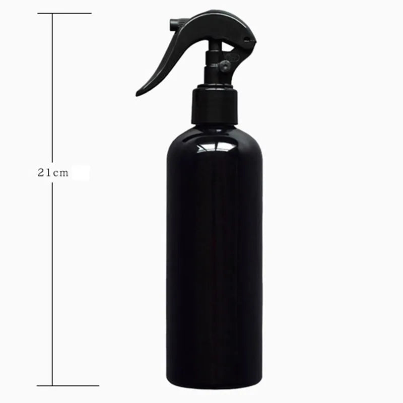 Black succulent gardening tools set with scissors, tweezers, shovels, watering bottle, and cushion for small plants.