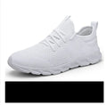 Men's black and white mesh casual sneakers with lace-up front and PVC sole