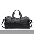 Large black PU leather sports training bag showing multiple internal organiser pockets and a single shoulder strap.