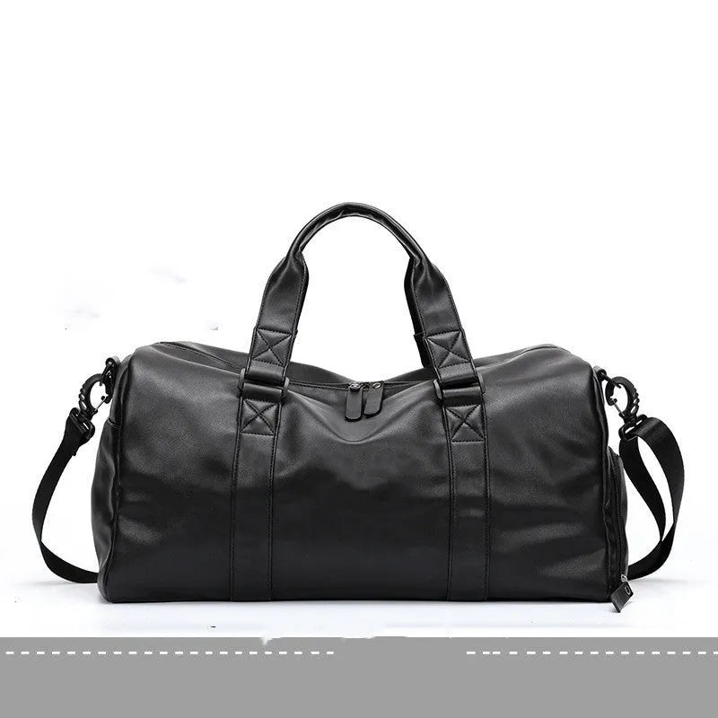 Large black PU leather sports training bag showing multiple internal organiser pockets and a single shoulder strap.