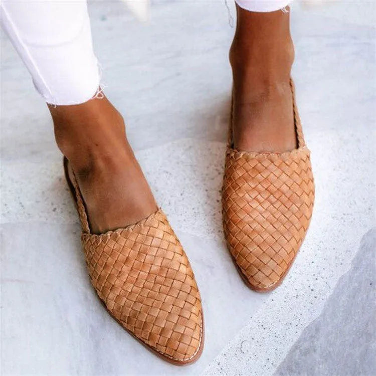 Women's pointed toe buckle flat sandals in microfiber with rubber sole showing buckle closure detail