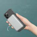 Silver aluminium Apple wireless magnetic charging power bank showing 5000mAh capacity and USB-C port