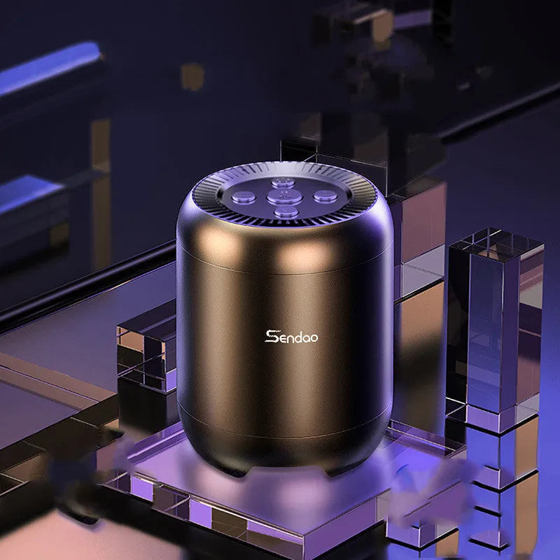 Small black or white portable Bluetooth speaker with card reader slot and USB port.