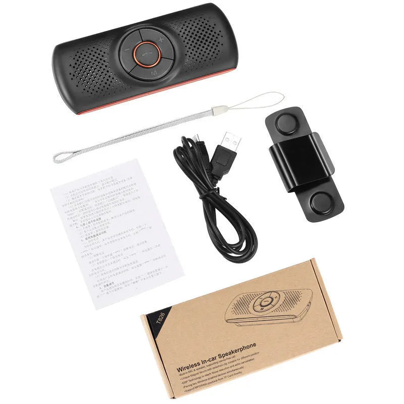 Orange Bluetooth car hands-free speaker unit shown mounted on a car sun visor.