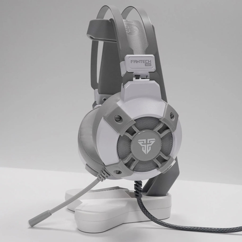 Fantech HG11 black gaming headset with RGB lights on ear cups and a USB cable.