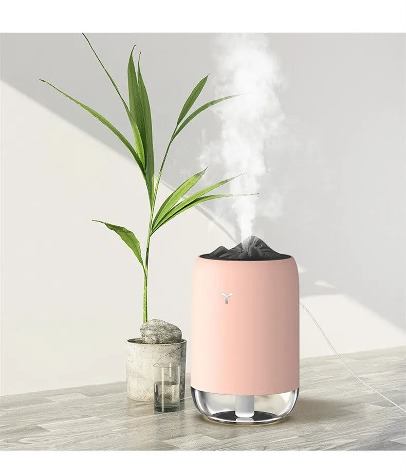 Magic Flame columnar humidifier in white with USB cable for desktop placement