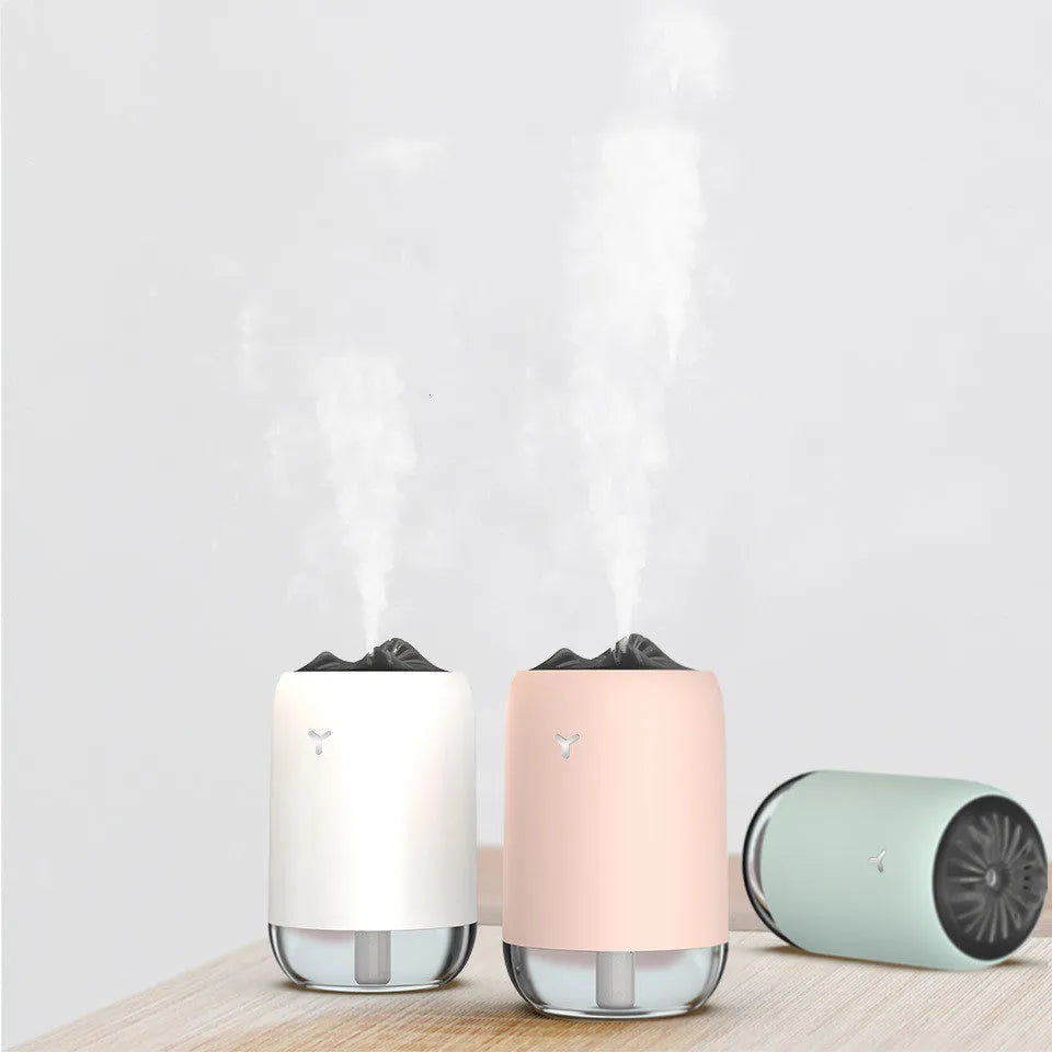Magic Flame columnar humidifier in white with USB cable for desktop placement