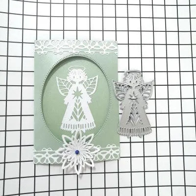 White angel-shaped carbon steel knife mould for embossing measuring 8x6cm