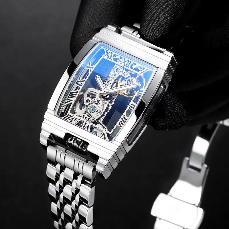 Daystar square stainless steel mechanical watch with leather strap on wrist, showing 42mm dial.