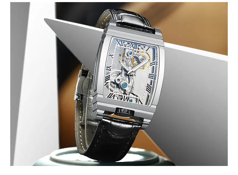 Daystar square stainless steel mechanical watch with leather strap on wrist, showing 42mm dial.