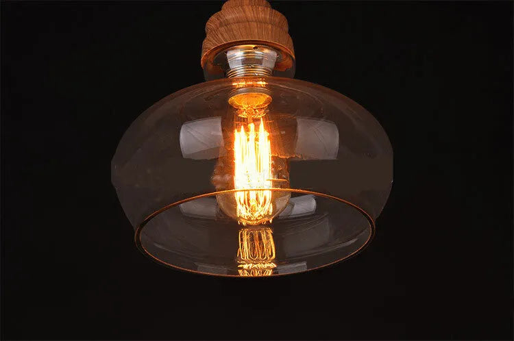 Nordic style glass pendant light with wood grain finish and adjustable hanging cable