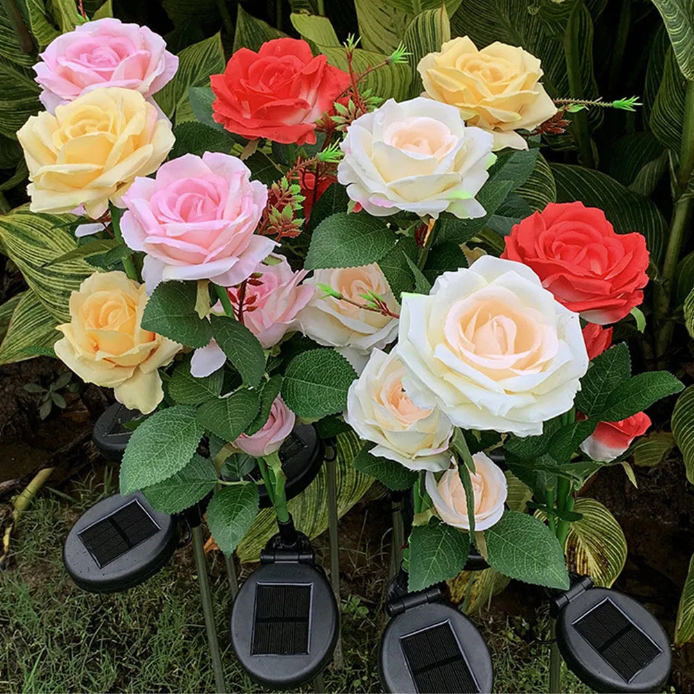 Three-headed solar rose garden light with ground spike and white LED illumination
