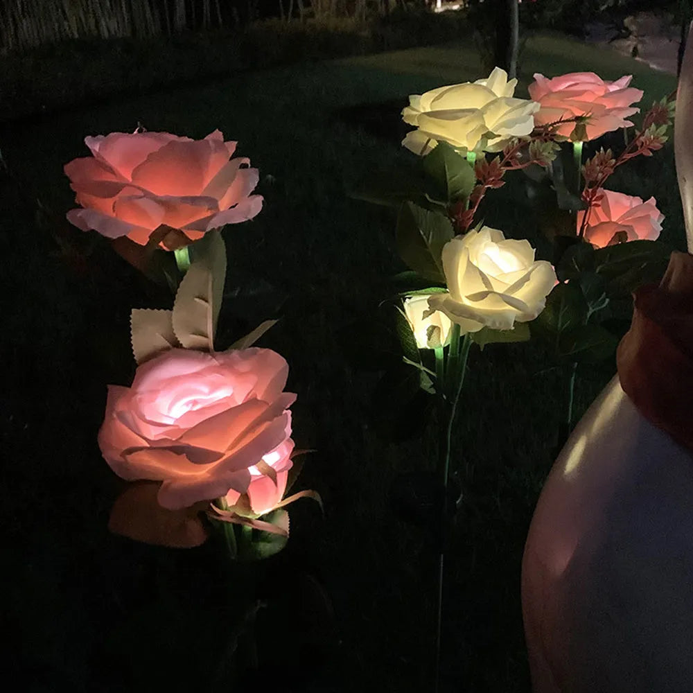 Three-headed solar rose garden light with ground spike and white LED illumination