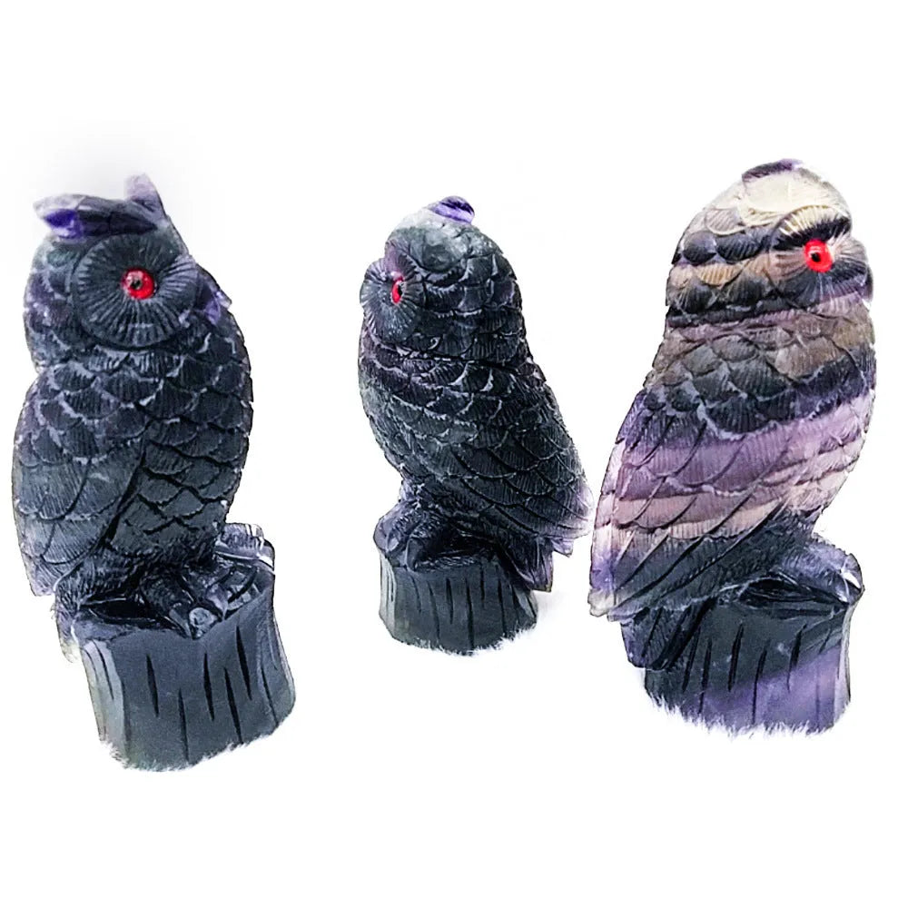 Purple fluorite carved owl ornament measuring approximately 4 inches tall