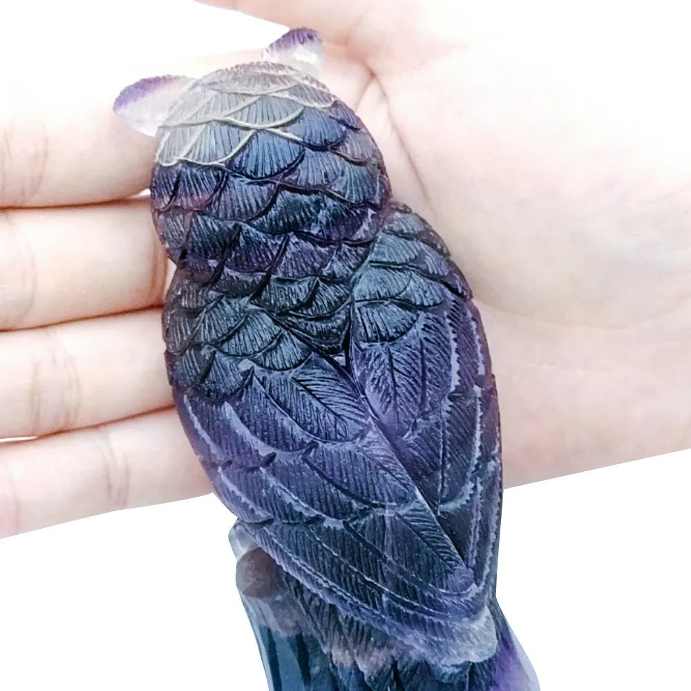Purple fluorite carved owl ornament measuring approximately 4 inches tall