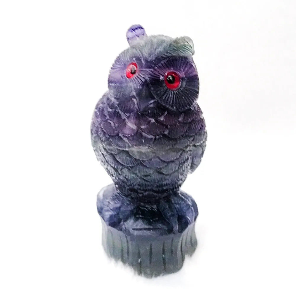 Purple fluorite carved owl ornament measuring approximately 4 inches tall