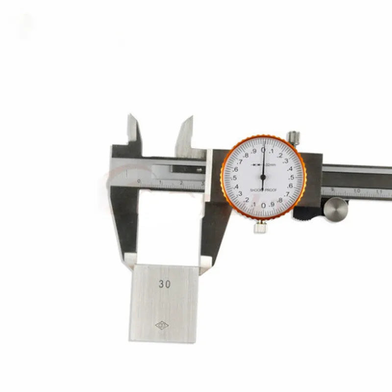 Black and white plastic vernier caliper showing 0-150mm measurement scale with 0.1mm graduation markings