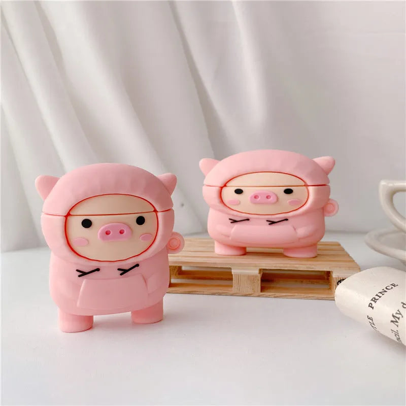 Pink cartoon pig design silicone flip case for Apple AirPods with an attached metal carrying hook.