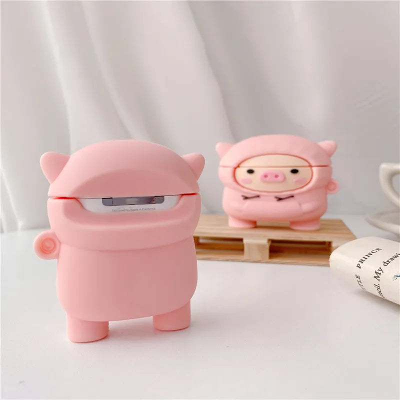Pink cartoon pig design silicone flip case for Apple AirPods with an attached metal carrying hook.