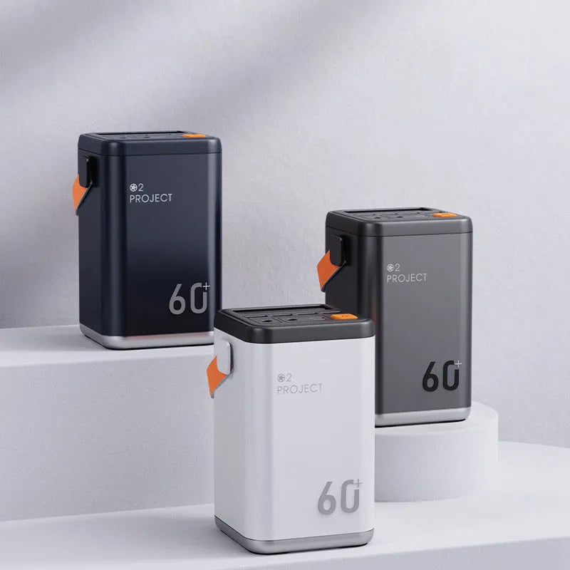 Grey outdoor power bank with 60000mAh capacity showing multiple USB charging ports