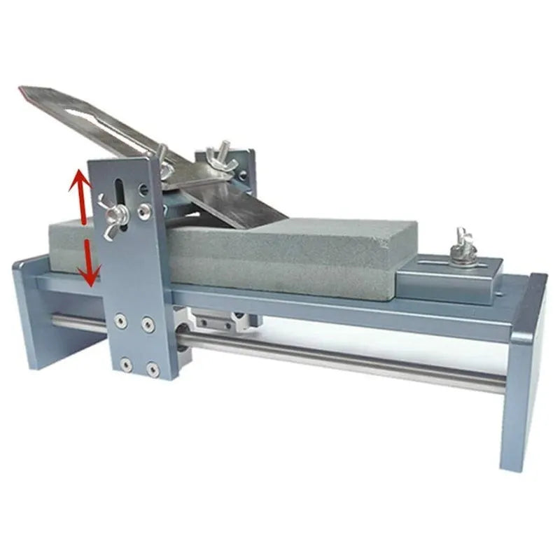 Aluminium alloy fixed angle sharpening tool for woodworking chisels and carving knives on a workbench.
