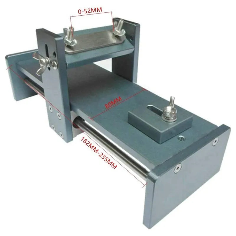 Aluminium alloy fixed angle sharpening tool for woodworking chisels and carving knives on a workbench.