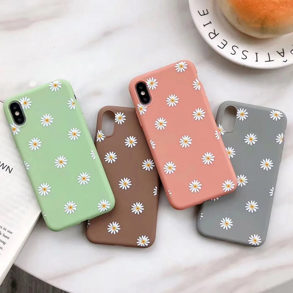 Daisy phone case with glass back cover for iPhone, available in orange, grey, green, and brown.