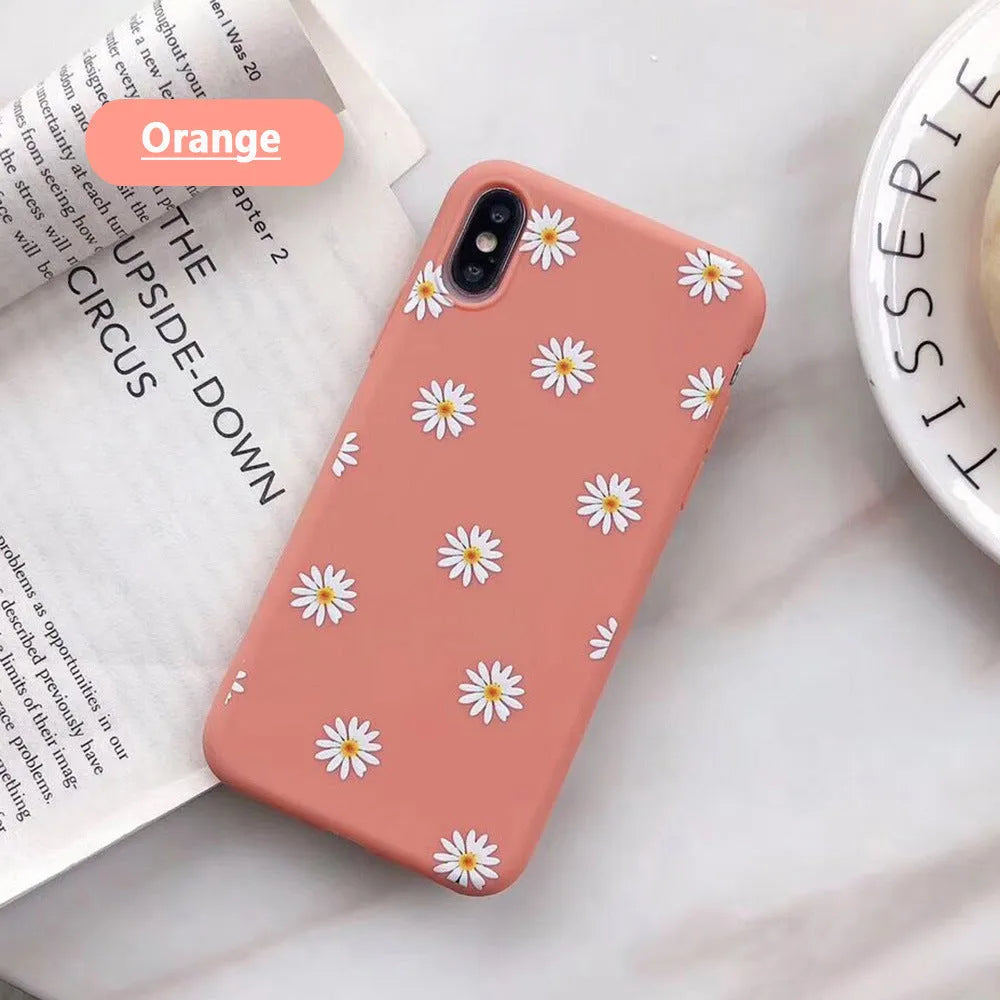 Daisy phone case with glass back cover for iPhone, available in orange, grey, green, and brown.