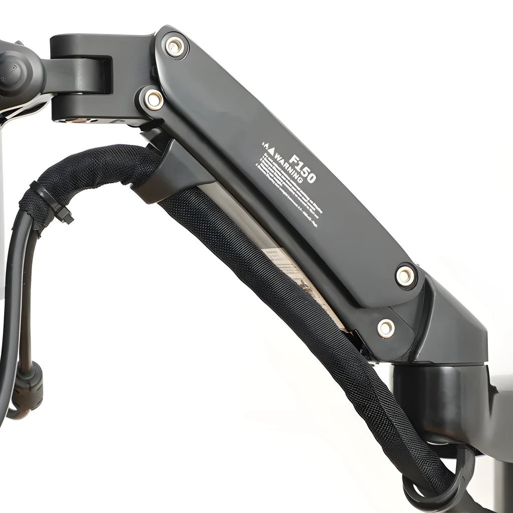 Black wall-mounted adjustable monitor stand with extending arm for computer screens.