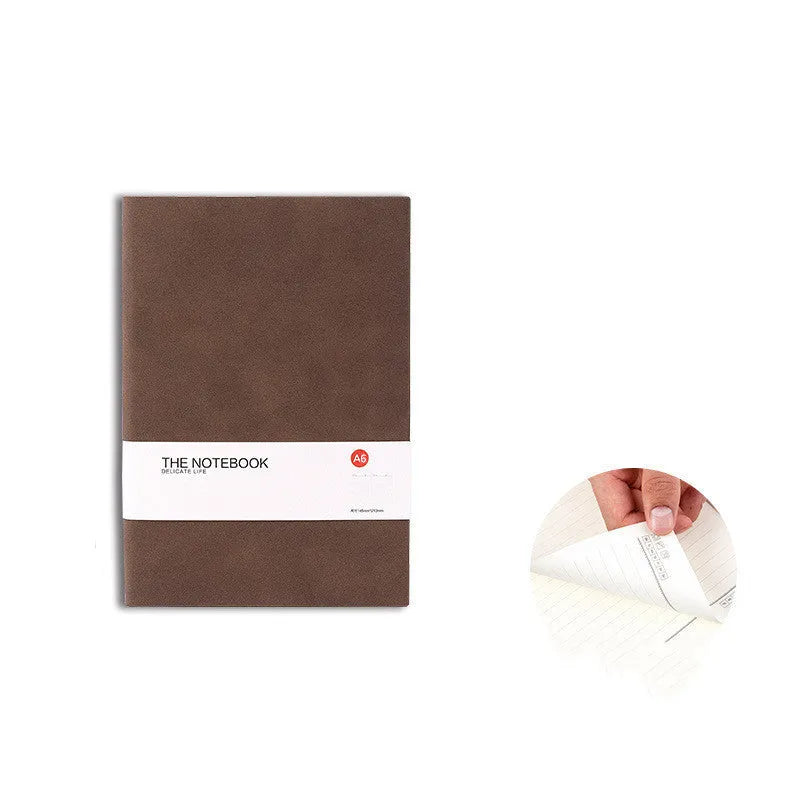 A5 and B5 sized solid colour thickened paper notebooks in brown, grey, green, red, and navy blue.