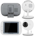 White 3.5 inch digital wireless baby monitor and UFO-style camera on a nursery shelf.