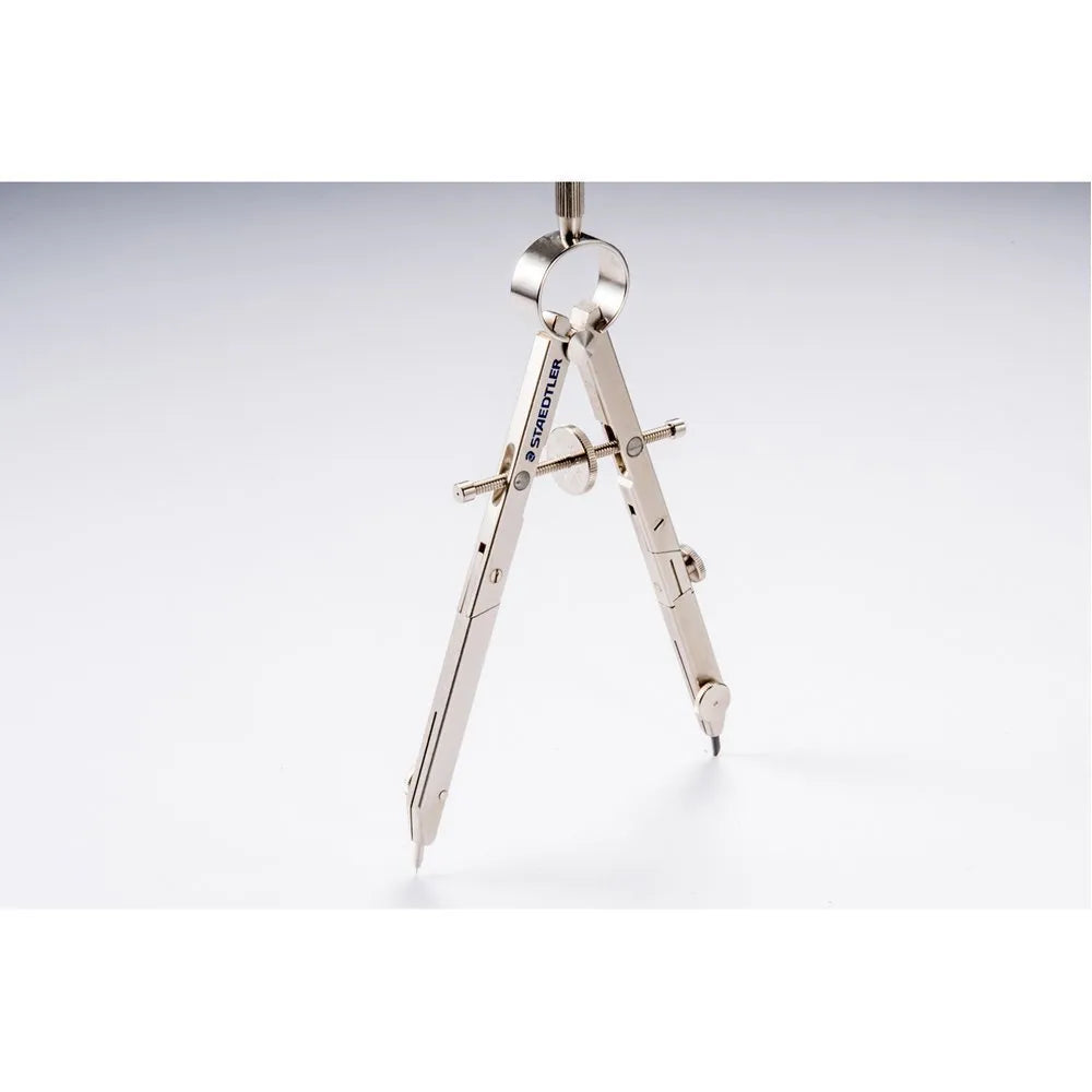 STAEDTLER 551 01 steel precision car compass with telescopic rod extended on technical drawing.