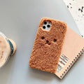 Brown embroidery plush cartoon bear iPhone case showing TPU construction and precise port cutouts