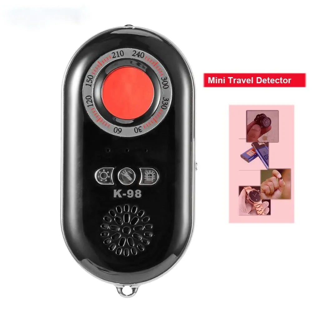 Small black wireless signal detector with vibration alarm for travel security, shown next to a ruler showing 85mm length.