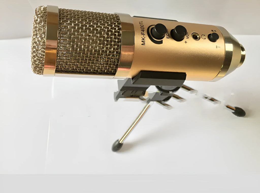 Gold wireless condenser USB microphone with heart-shaped pickup pattern and mounting bracket.