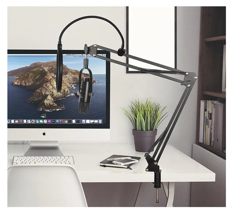 Black BM-86PRO USB condenser microphone on a metal base with sponge cover, alongside its USB cable.