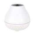 White round Bluetooth humidifier and aroma diffuser unit with built-in speaker and night light