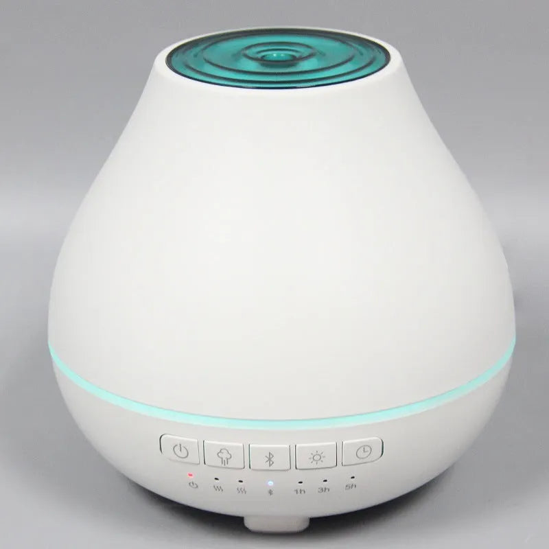 White round Bluetooth humidifier and aroma diffuser unit with built-in speaker and night light