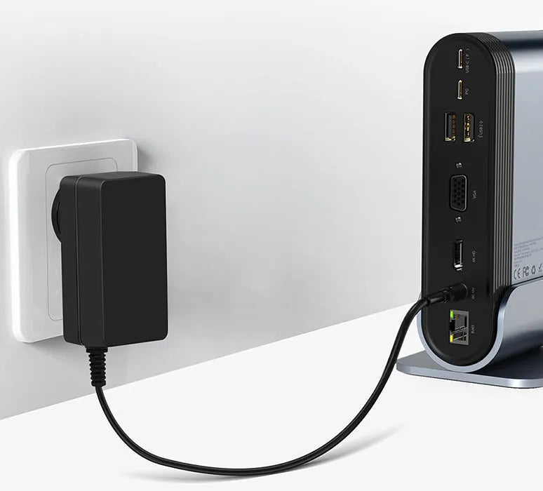Deep space grey 16-in-1 USB-C docking station hub on a desk, showing multiple ports.