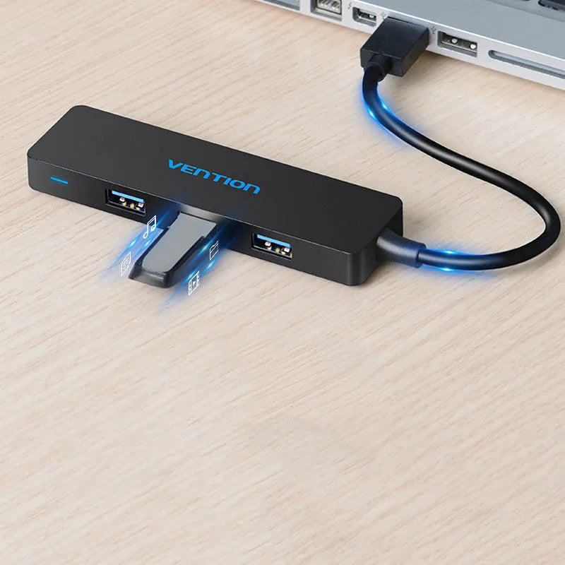 Black four-port USB 3.0 hub with short cable and nickel-plated connectors