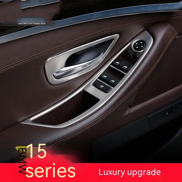 Set of four ABS stainless steel decorative strip stickers for BMW 5 Series interior door handles.