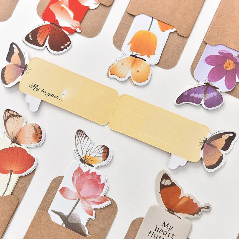 Colourful butterfly design flat paper bookmark on a white background.